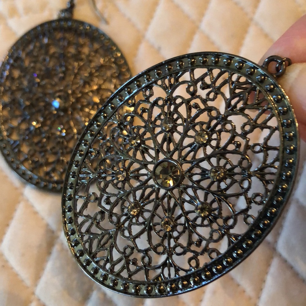 Long oval filigree antiqued silver tone metal + center crystal hanging earrings